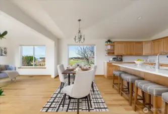 Kitchen overlooks the dining space and into the sitting room or "sun room" as we call it because evening sun streams into this space.