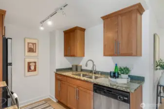 Kitchen has plenty of counter and cabinet space.