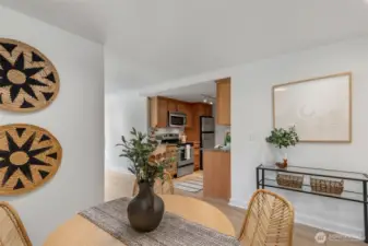 Formal dining is open to both kitchen and living.