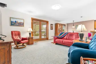 French doors go to the covered deck from the family room & kitchen