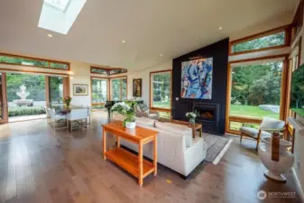 Living/dining area seen from west side, looking toward the garden.