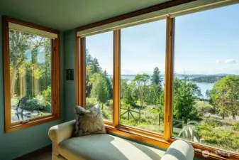 The library windows afford views of Fisherman Bay and Lopez Island's peninsula, the tombolo beach of Otis Perkins Park, San Juan Channel, and peekaboos of Vancouver and Salt Spring Islands.