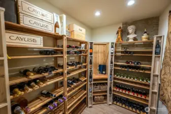 The wine cellar on the lower level is naturally cooled.