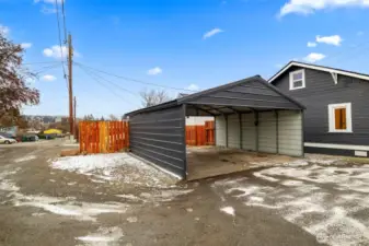 The carport allows for drive-through access.