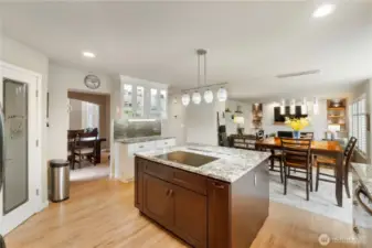 From coffee to cocktails. This stunning kitchen blends functionality and flair with endless counter space, smart layout, and a view out to the covered deck.
