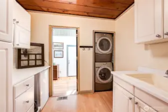 Mud room with plenty of cabinets & sink!