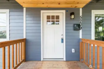 Covered entry porch the occasional rainy day for your convenience.