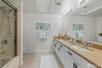 Walk-in shower/bath combo in primary bathroom