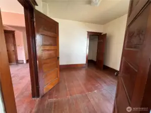 Front Bedroom looking towards Dining Room and front entryway