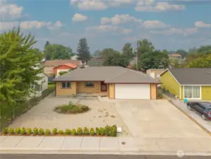 Front of home with low maintenance yard