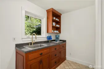 Just off the kitchen is a butler's pantry that makes the perfect morning coffee station and extra washing space for parties.