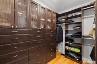 Primary bedroom walk in closet.