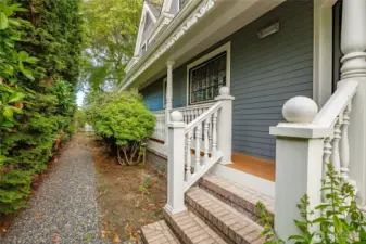 These are stairs from the West side of the house leading to the sitting Room/breakfast nook area off the kitchen. This deck is wrapped all the way around to the front of the home.