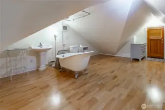 Accessory Unit above the garage accessed by the exterior spiral staircase.