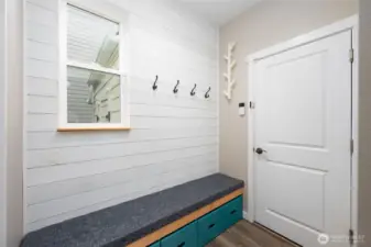 Custom built mud room bench complete with cubbies for outdoor shoes