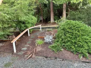 stairs to mail boxes and dumpster