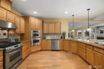 Gourmet kitchen with stainless steel appliances and ample storage
