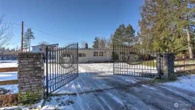 Enjoy a fully-fenced lot with gated entry for added security.