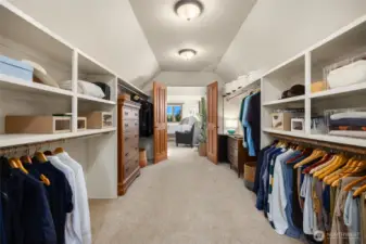 The primary closet is a must see with no shortage of space. And if this is not enough, to the left here, is another door leading to more storage space!