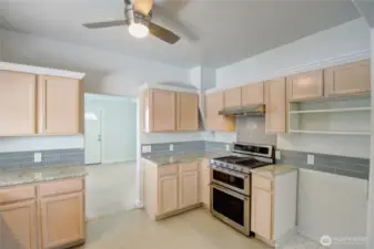 The gas stove with a double oven will delight the chef.