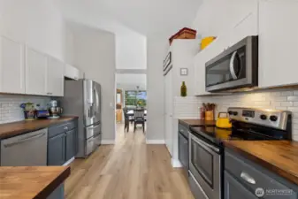 Spacious kitchen with vaulted ceilings & pantry