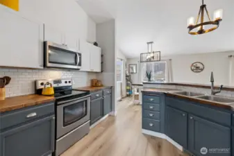 Spacious kitchen with vaulted ceilings & pantry