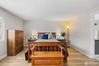 Large primary bedroom with attached 5 piece bathroom & walk-in closet