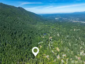 THE HOMES IN THE PHOTO CLOSEST TO THE ARROW ARE IN THE WILDERNESS RIM NEIGHBORHOOD. TO ACCESS THE PROPERTY, YOU DRIVE THROUGH THIS NEIGHBORHOOD.