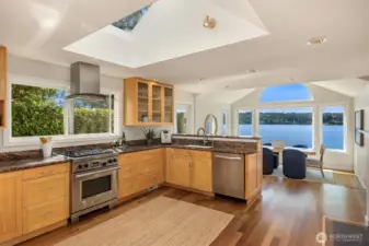 Chefs kitchen with Wolf range ample room to move about and have friends over to help with the cooking!