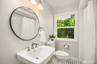 Full bath shared by two spare bedrooms.