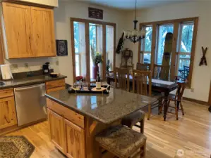 Full kitchen with hickory cabinets, stainless appliances and granite counters. Hickory cabinets add to the cabin feel.
