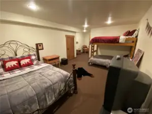 Lower level playroom and bedroom; accommodates five with bunk bed, full bed, and queen bed.