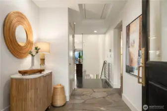 A welcoming foyer with clean lines and warm textures, creating an immediate sense of style and comfort.