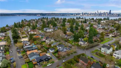 A rare perspective showcasing the home’s prime North Admiral setting, with Puget Sound and the Seattle skyline beyond.