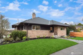 A refined blend of mid-century inspiration and modern updates, set on a manicured corner lot.