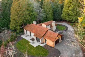 Set on three private acres, the property offers space, serenity, and a rare sense of seclusion.