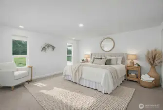 Your primary suite! An abundance of space for a king sized bed and furnishings. Your suite is flooded with natural light from 2 floor to ceiling windows. Abundance of closet space with 2 walk in closets and separate linen closet. Direct access to your beautifully remodeled and private en suite bathroom with access to your own private covered patio. Photo is virtually staged.