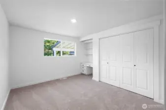Fantastic sized second bedroom with views to the fenced backyard. Recessed lighting and new carpeting throughout. Ready for your vision.