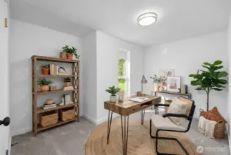 Another great sized 3rd bedroom virtually staged as an office. Floor to ceiling window has views of property and front walkway. Perfect for an office space or additional bedroom with great sized closet.