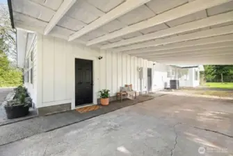 ADU Entrance! Covered multi car carport provides access to ADU. Separate entry from main home allows privacy, multi family living potential, rental opportunities, business opportunity, etc.