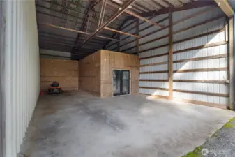 Look into 5th, largest bay in shop! Small room framed out as additional living space. Use your vision to finish the space as you please, or easily remove to utilize 5th bay to full potential. Potential boat storage, RV storage, or finish for additional rental income - your choice!
