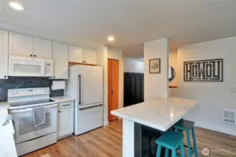 Looking back through kitchen, nice appliance all stays with the home