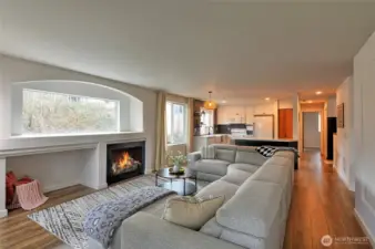 Living room with a nice natural gas fireplace.