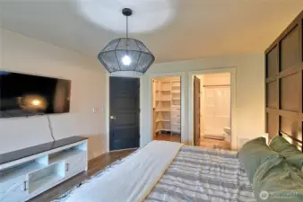 Primary bedroom looking into the walk-in and bathroom