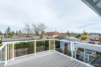 Master bedroom private deck with stairs to the yard.