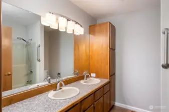 Upstairs bathroom with dual sinks