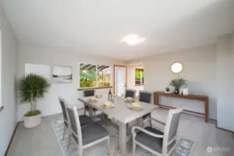 Dining room w/access to deck (virtually staged)