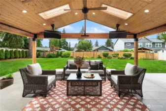 Covered patio with heaters, fan and TV