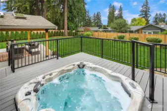 Backyard jacuzzi can be reach right off the bedroom level hall