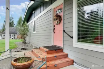 Front entry view of main house. Gorgeous new stoop and deck in the back.